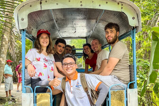 Small-Group Mekong Delta Day Trip: Boat Ride, Cottages & Pagoda - Traditional songs, local animals, and the more staged moments